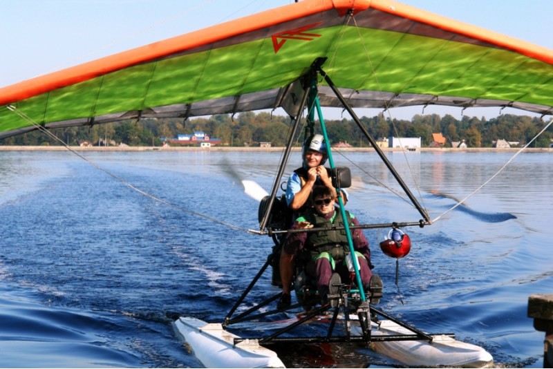 Hang gliding from water or land