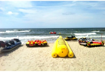 Entertainment with inflatable water tire in the Baltic Sea