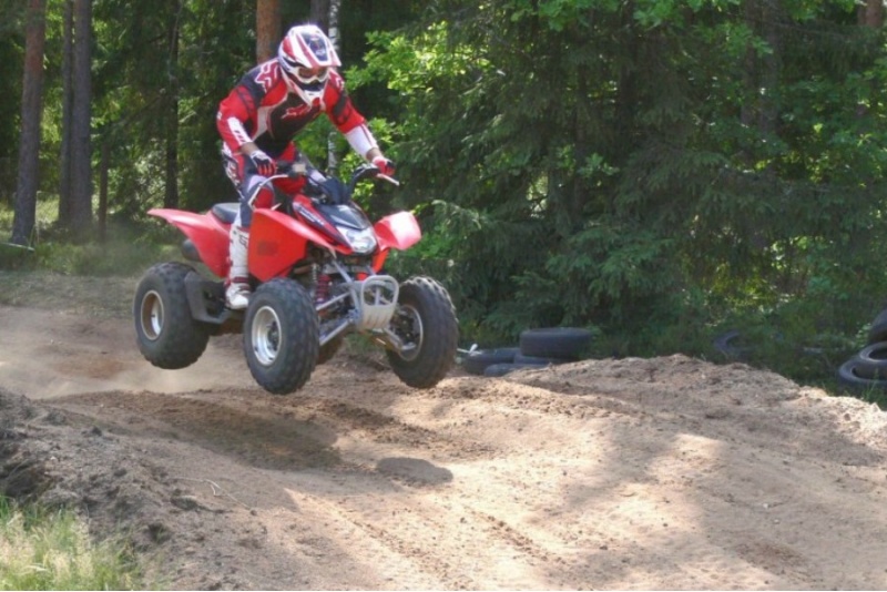 Thrilling ride on quad bike in forest